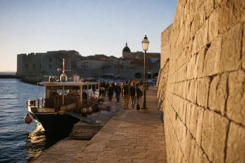 The Lokrum ferry docked at the Old City Port with passengers boarding