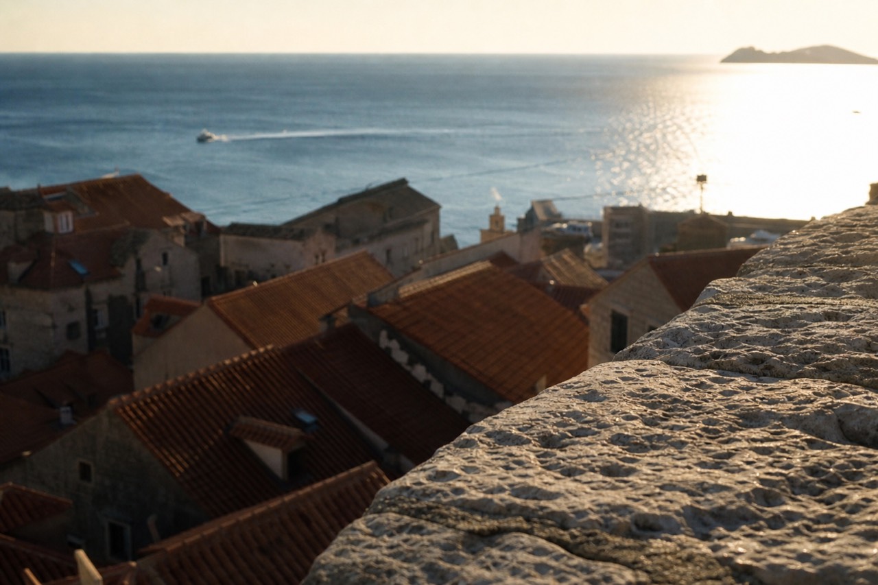 Dubrovnik Old Town rooftops seen from the city walls with the Adriatic sea beyond