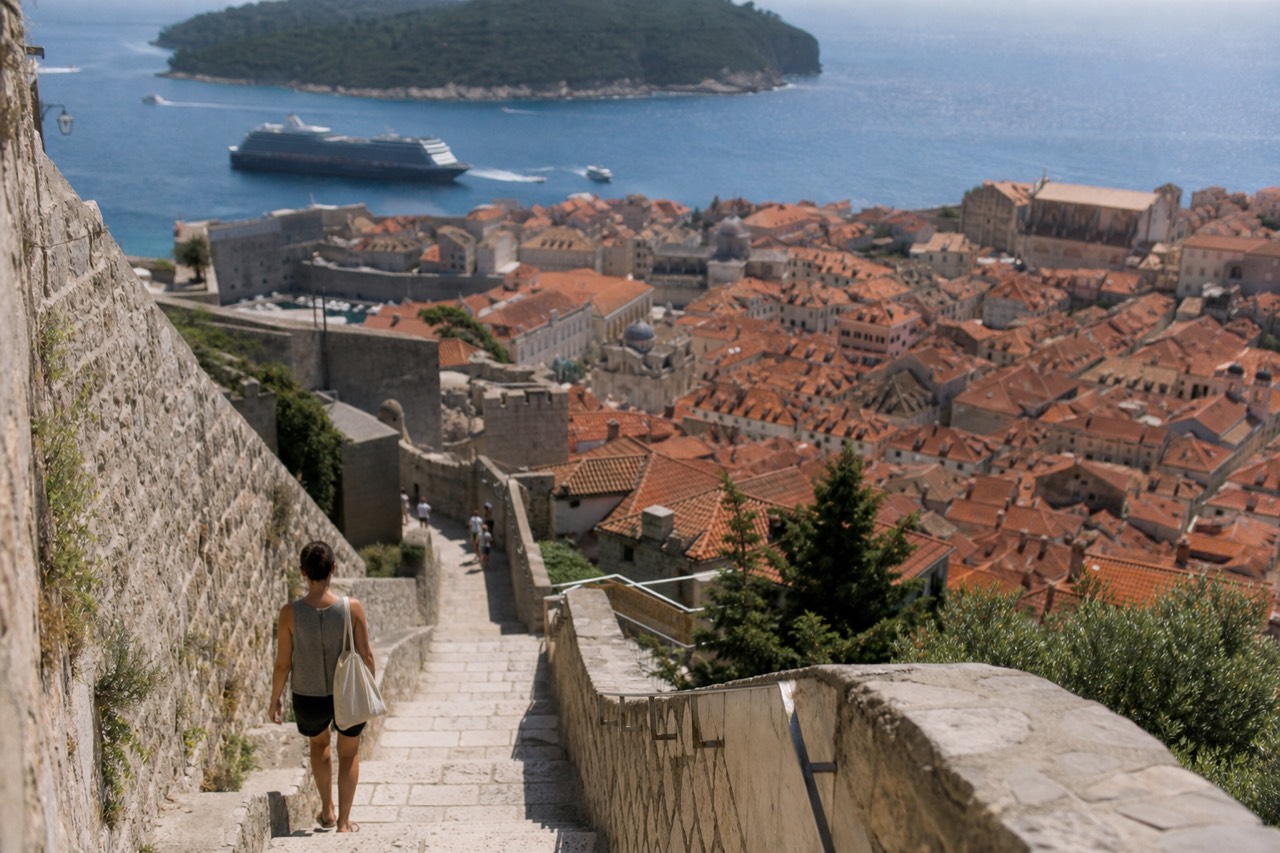 Aerial view of Dubrovnik Old Town and the Adriatic Sea with cruise ships in the distance