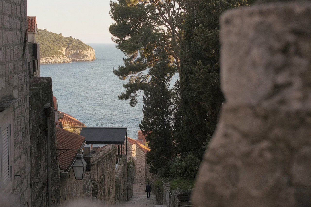 Evening light on the stone buildings and narrow lane of Dubrovnik Old Town