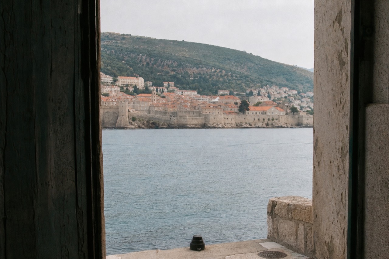 The walled Old Town of Dubrovnik seen from the Adriatic sea on a calm morning