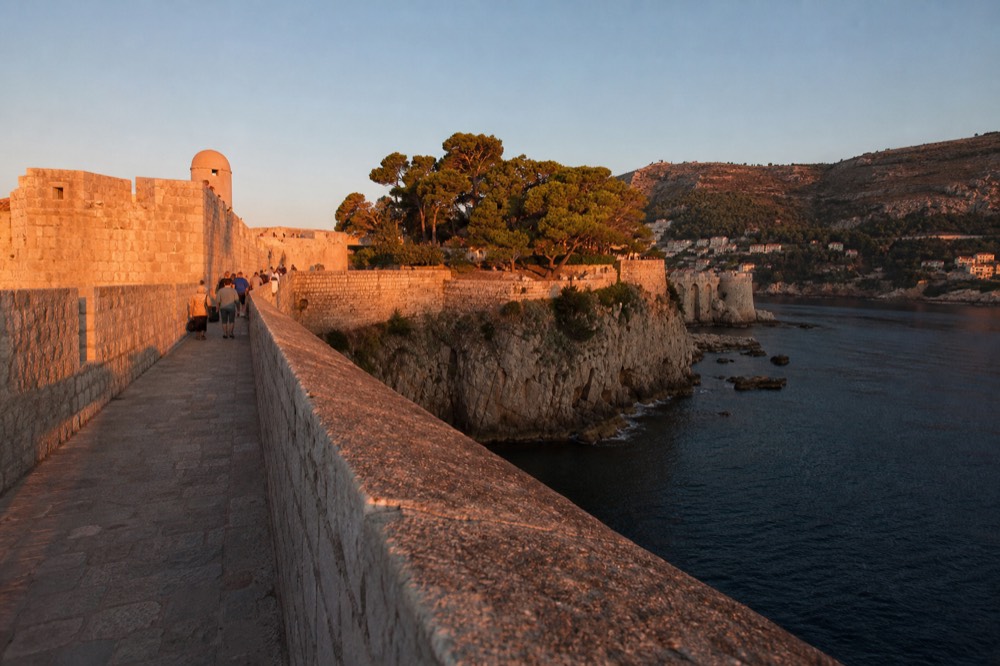 Evening light on the outer wall and park trees near Pile in Dubrovnik