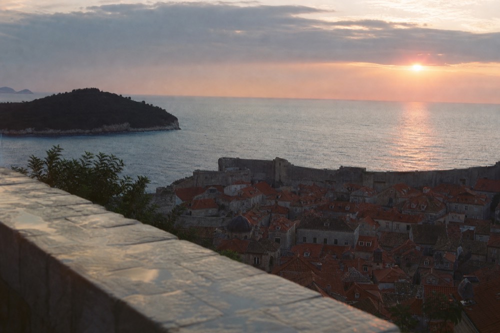 Sunset over Dubrovnik rooftops and the Adriatic sea from a high viewpoint