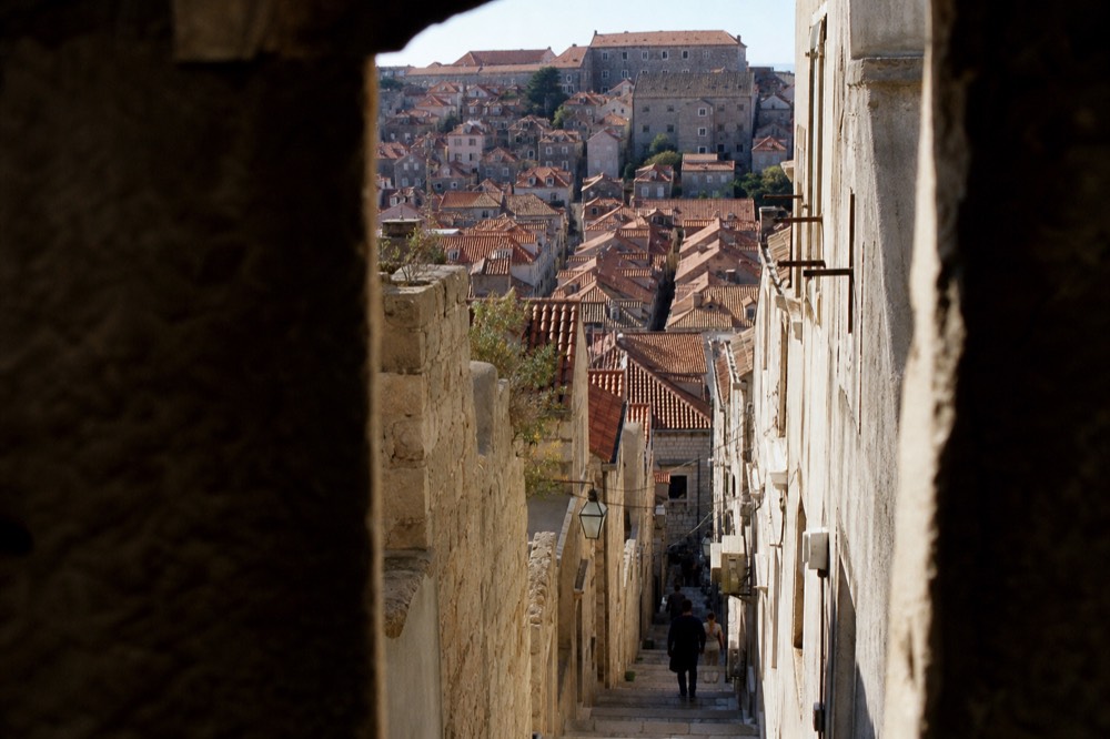 Low winter sun lighting the terracotta rooftops of Dubrovnik Old Town