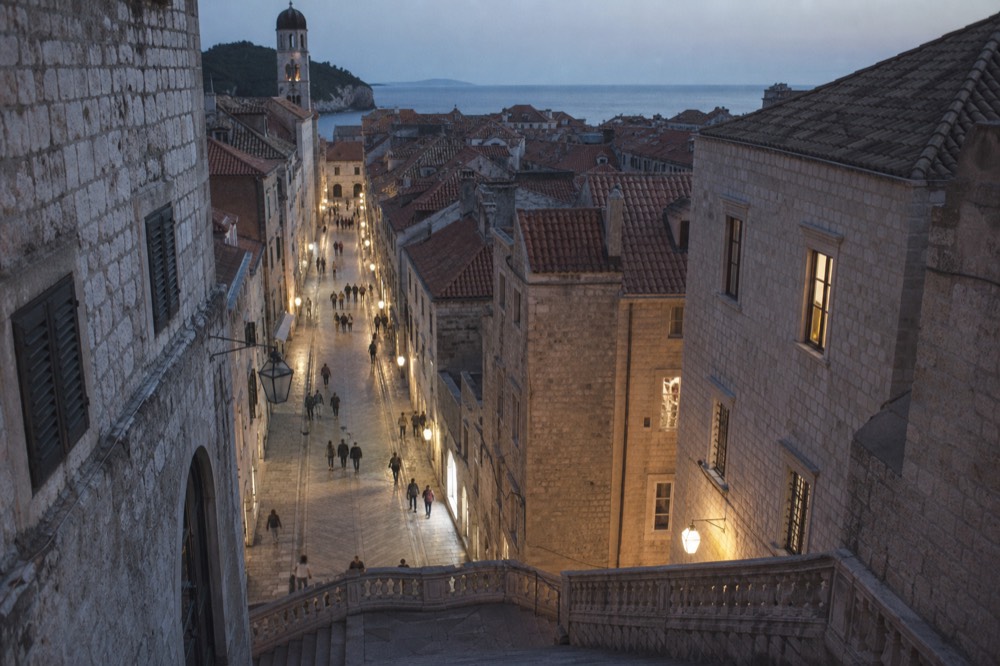 Wide limestone street in Dubrovnik Old Town polished by footsteps
