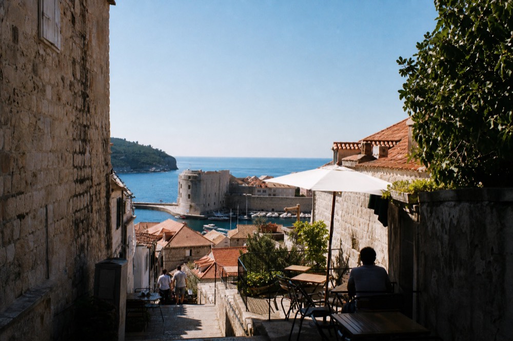 A quiet backstreet cafe in the Old Town with a few tables and stone walls