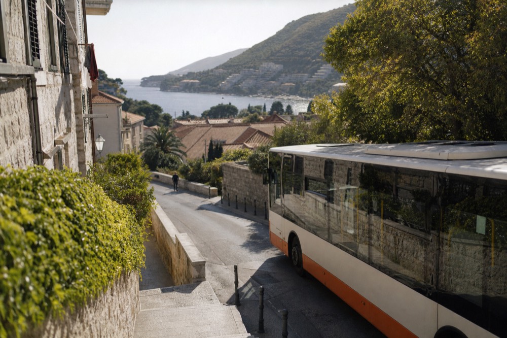 A Dubrovnik public bus on the number 6 route passing through Lapad
