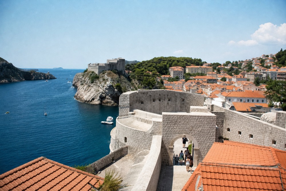 The western stone gate into Dubrovnik's Old Town, its arch framing the street beyond