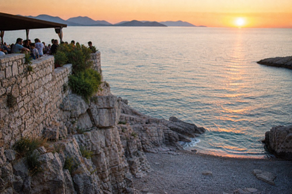 Sunset over an Adriatic island silhouette seen from a coastal viewpoint