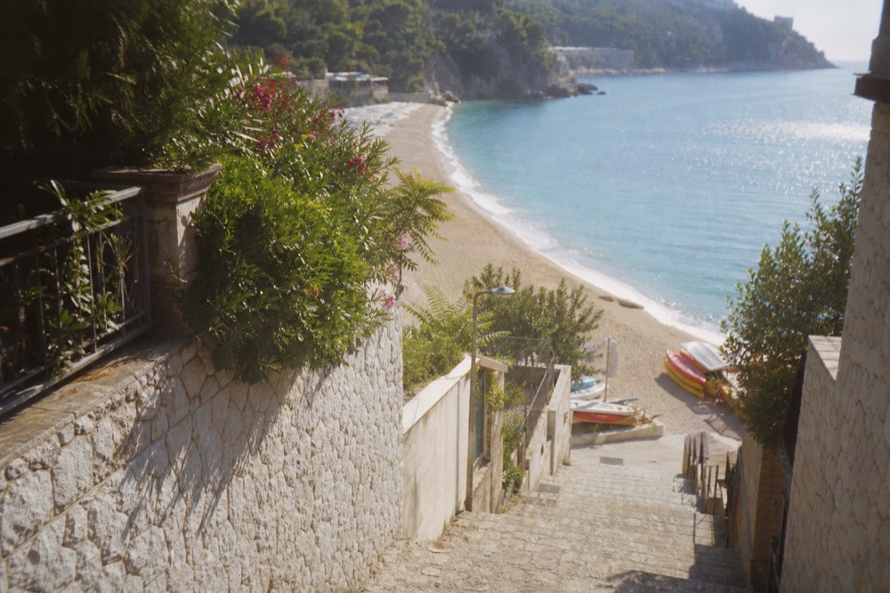 Copacabana Beach with sandy shore and water sports equipment