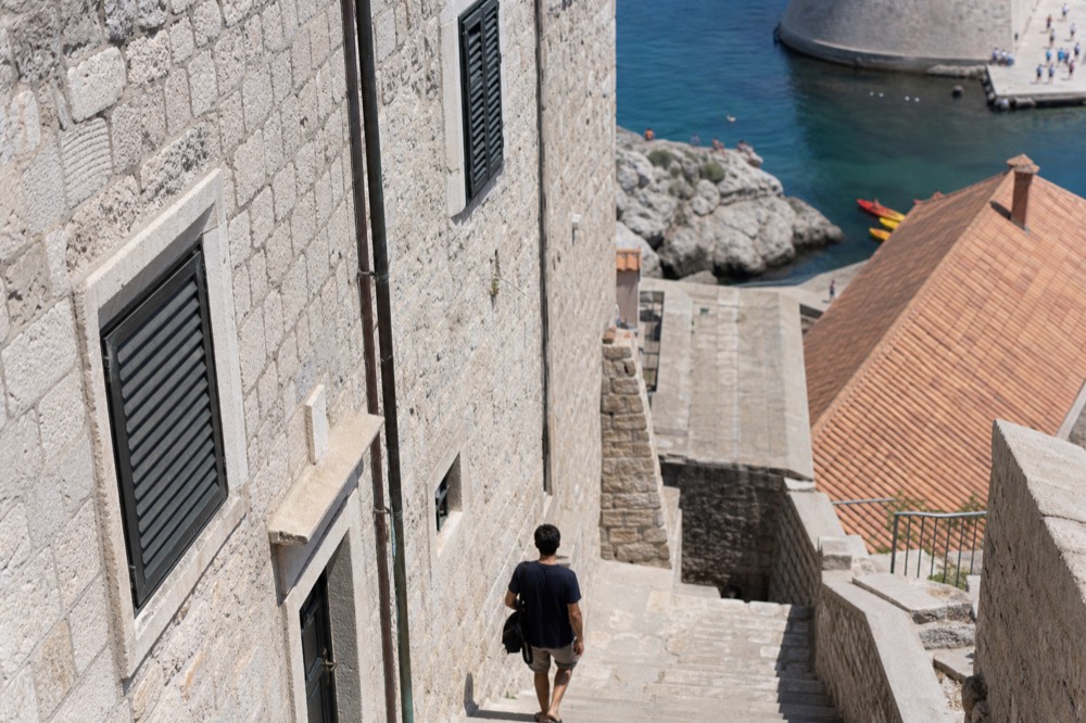 Historic stone building facade beside the old harbour in Dubrovnik