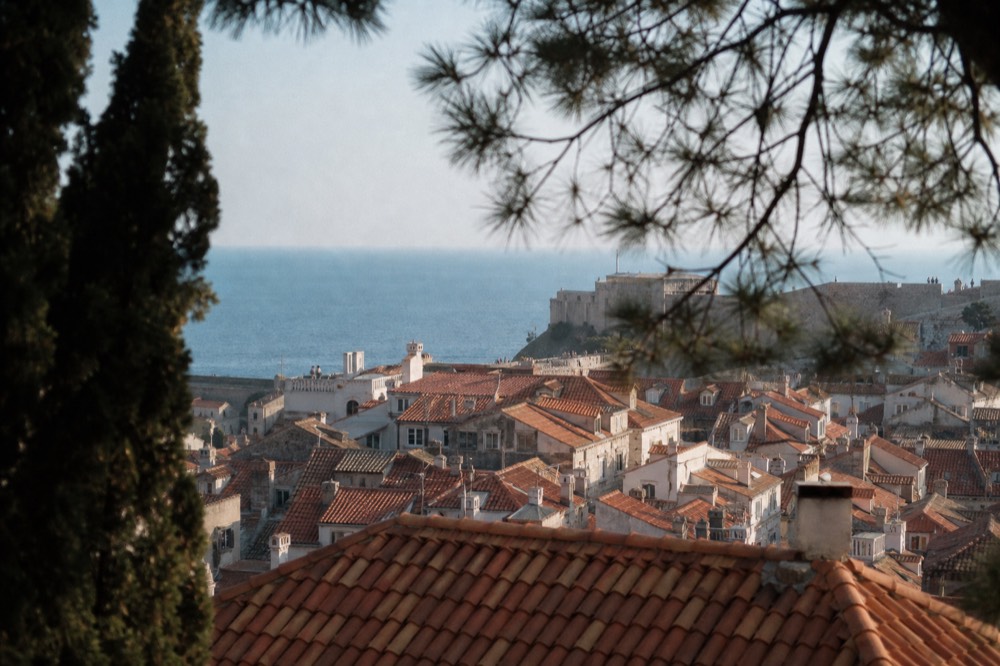 Evening light on Dubrovnik rooftops and the Adriatic horizon from a high viewpoint