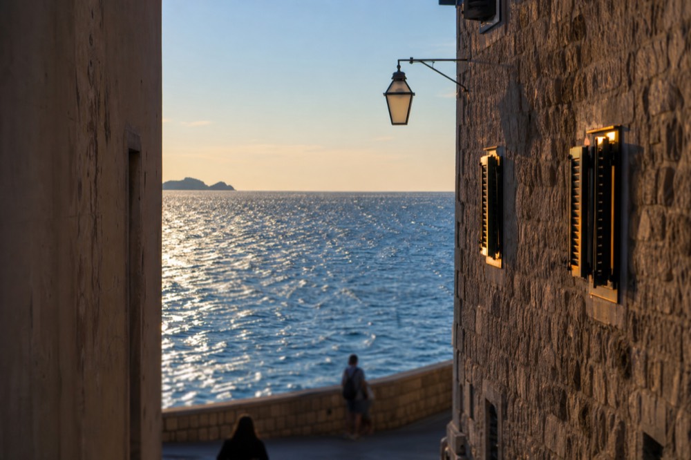 Sunlight on gentle waves in deep blue Adriatic water near Dubrovnik
