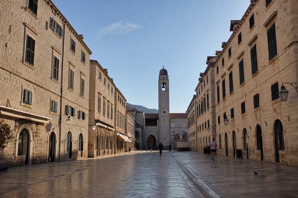 Early morning light on the Stradun with few people on the street