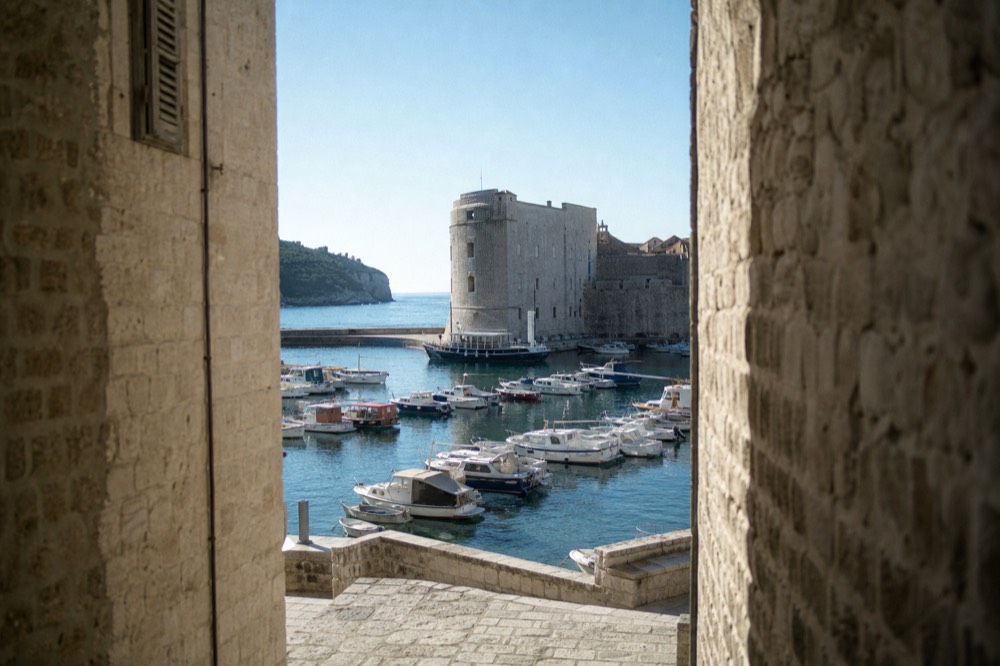 Harbour of Dubrovnik with boats moored along the old city port