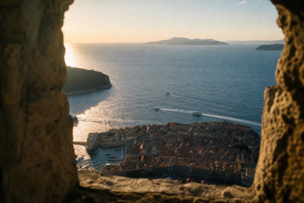 The view from Mount Srd over Dubrovnik Old Town and the Adriatic Sea with islands on the horizon