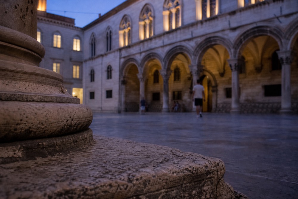 Interior courtyard of the Rector's Palace in Dubrovnik with stone arches